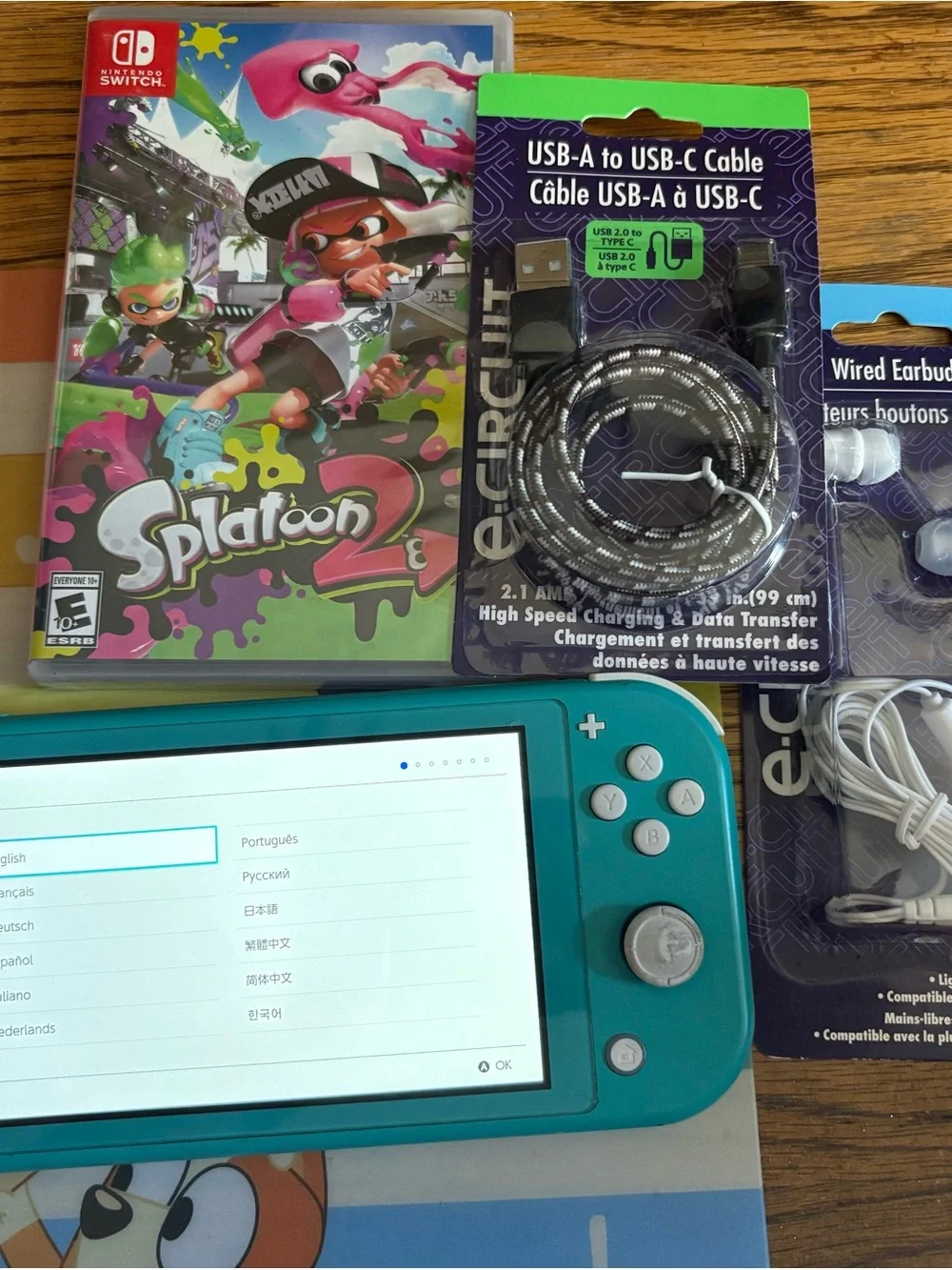 Nintendo Switch Lite Turquoise Handheld Console with Splatoon 2 and Accessories